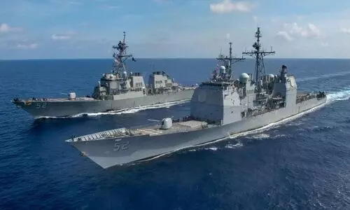 US Navy fires warning shot at Iranian vessels