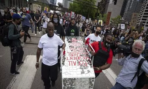 George Floyds family holds rally, march in brothers memory