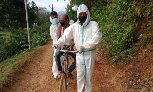 Dilapidated road: Health workers ferry COVID-19 patient on bicycle to ambulance
