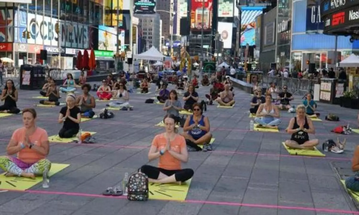 Over 3,000 people perform Yoga at iconic Times Square