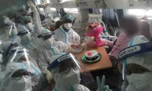 SMCH health care workers, family celebrate wedding anniversary of  COVID-19 patient