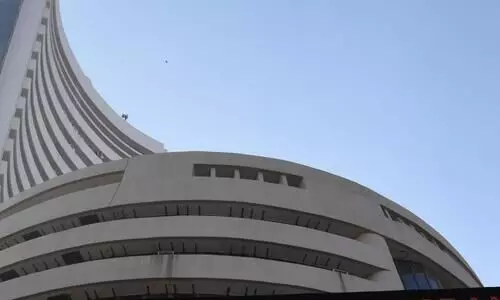 Sensex, Nifty turn flat after touching new highs