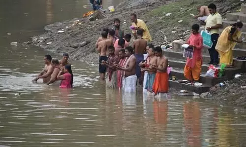 Throwing caution to the wind, people invoke Goddess Durga on Mahalaya