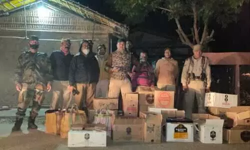 Huge consignment of foreign and country liquor seized in Raha, one held