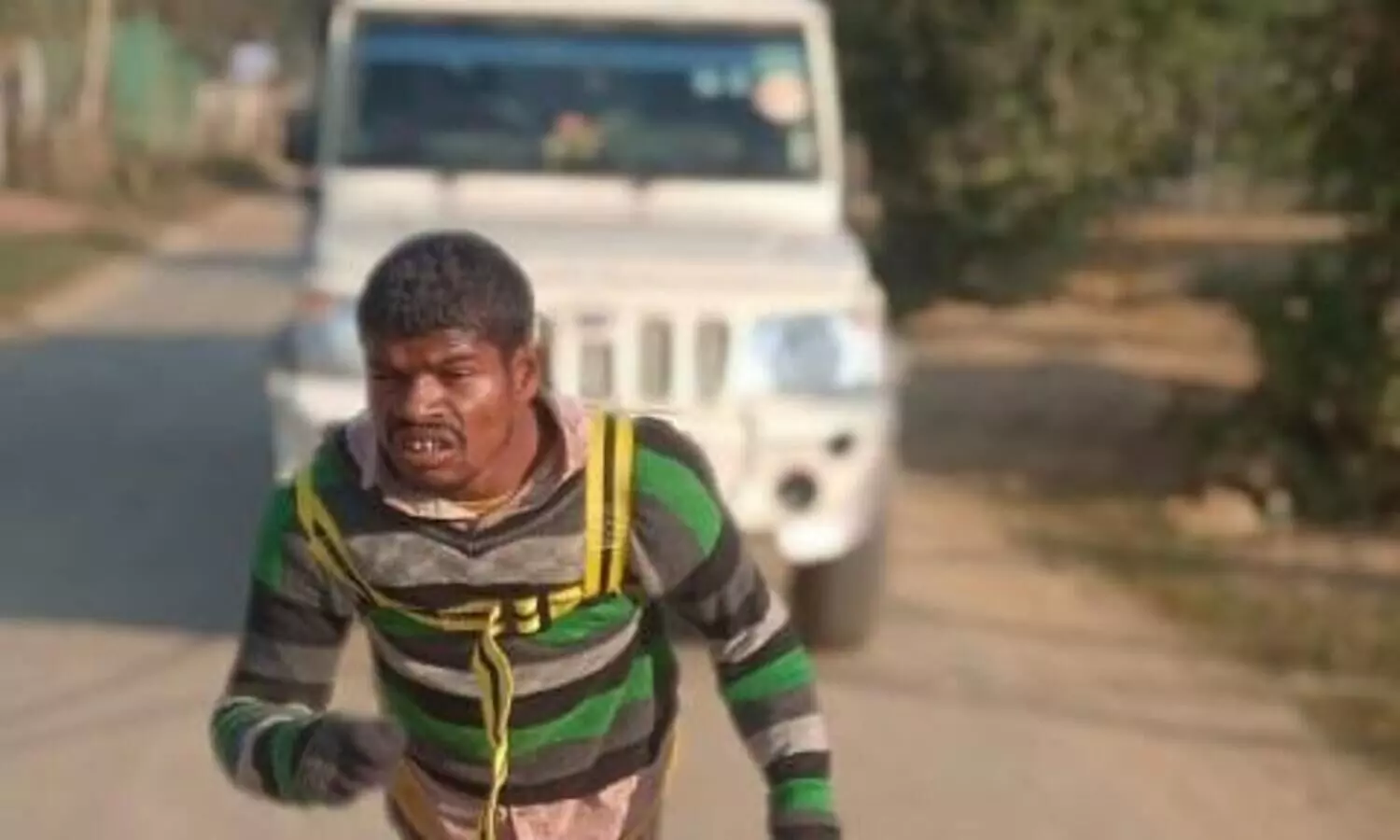 Video: Differently-abled youth from Sivasagar pulls pick-up truck with rope