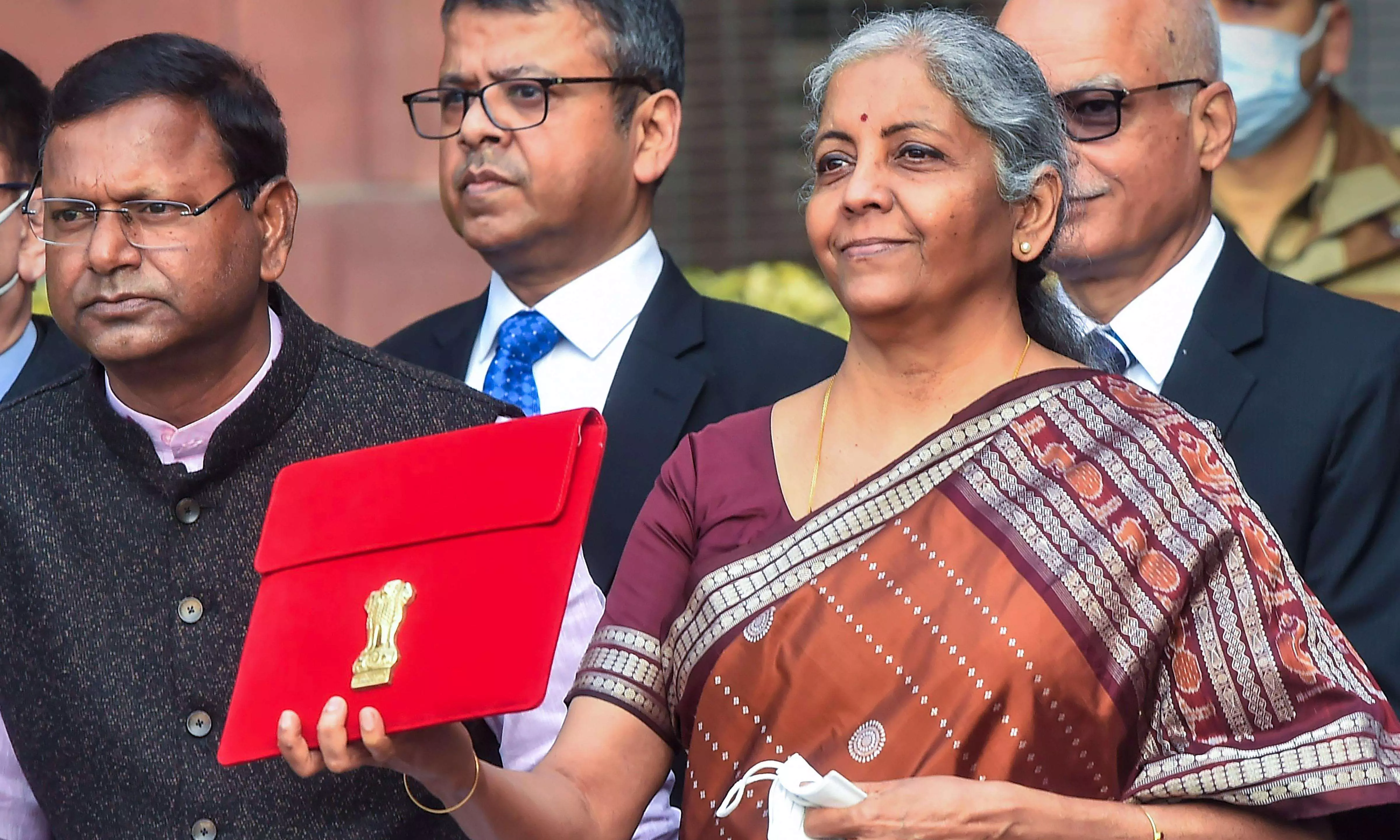 sitharaman takes tablet in red pouch to parliament to present paperless budget