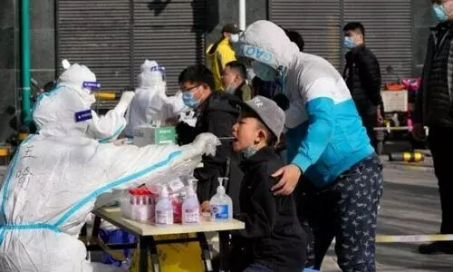 As Shanghai struggles with Covid, cases spike in Beijing