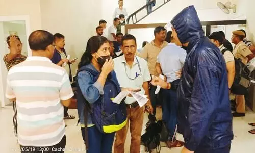 People looking for air tickets to Guwahati throng designated ticket counter at Cachar DC office