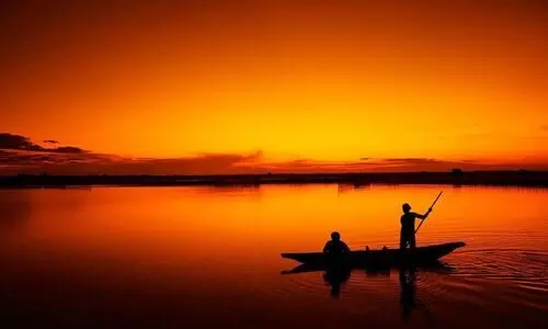 Assam: Students in Dhemajis Bishnupur attend school in country boats Assam: Students in Dhemajis Bishnupur attend school in country boats
