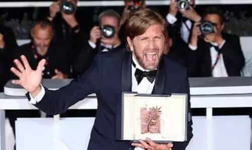 Ruben Ostlunds social satire Triangle of Sadness wins Cannes Palme dOr