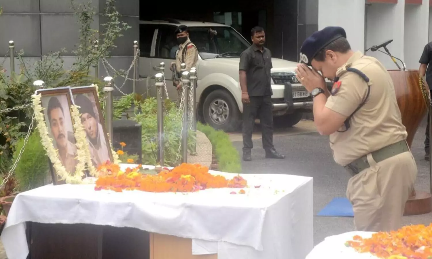 Two policemen washed away by flood waters, bodies found