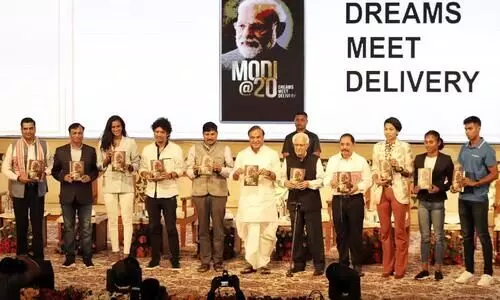 Modi @20: Dreams Meeting Delivery: Assam CM launches book on PM Modi