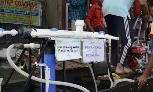 Boat mounted water treatment plant for flood relief in Silchar