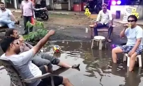What an idea! MP residents throw party on pothole-filled road