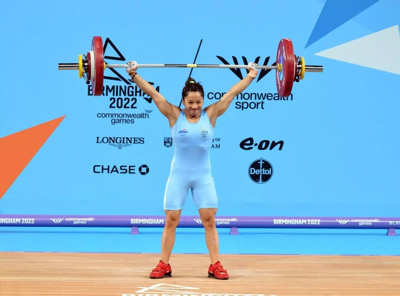 Weightlifter Mirabai Chanu clinches India's first gold medal at ...