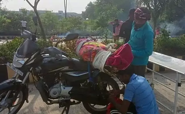 Denied hearse, MP man takes mothers body on bike for cremation Denied hearse, MP man takes mothers body on bike for cremation
