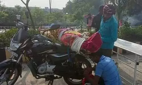 Denied hearse, MP man takes mothers body on bike for cremation