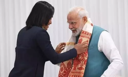 Nikhat gifts PM Modi boxing gloves, Hima gives traditional gamocha