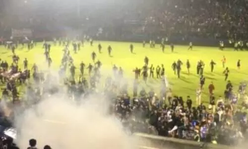 Death toll rises to 174 after fans stampede to exit Indonesian soccer match