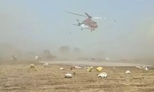 Plastic bags come flying, Yediyurappas chopper faces landing issues in Ktaka