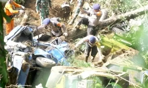 2 killed, 4 missing after landslides strike town near Jakarta