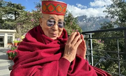 Dalai Lama apologises to boy, his family