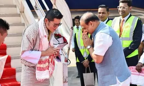 Bhutan King lands in Guwahati, Assam CM receives at airport