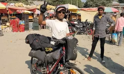 Pune cyclist visits Dhubri, aims to reach Myanmar on bicycle