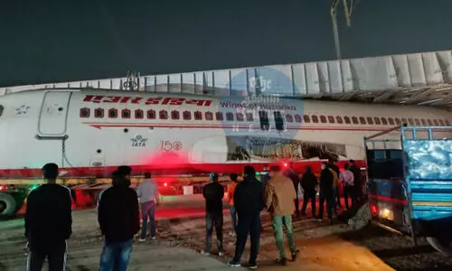 Guwahati: Plane transported to Assam by truck gets stuck under railway overbridge in Jalukbari