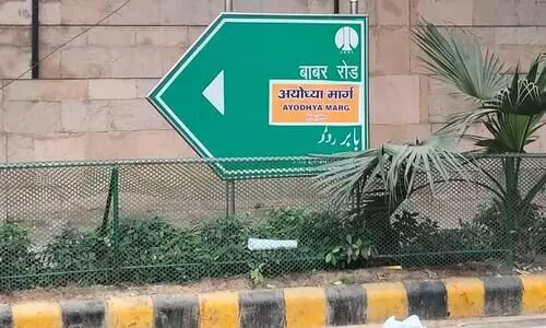 Delhi: Babar Road signage defaced; fringe group affixes ‘Ayodhya Marg’ poster