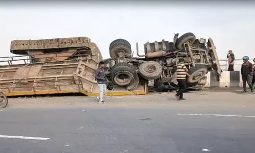 Horrific accident  on Bharalu-Brahmaputra road, vehicle skids near river