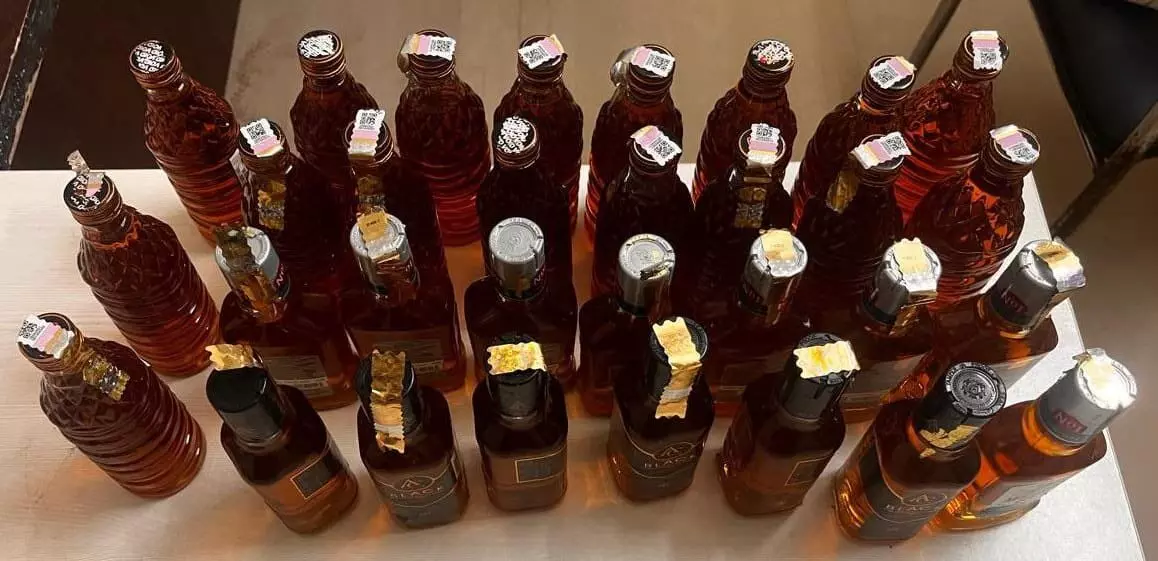 Two Chirang excise officials suspended for enabling illicit liquor trade Two Chirang excise officials suspended for enabling illicit liquor trade