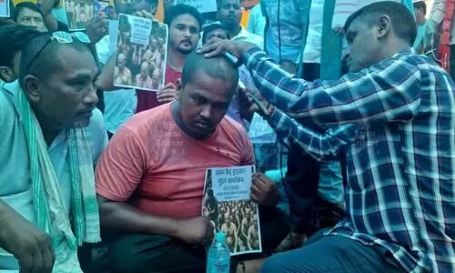 Guwahati cab drivers shave heads over high cuts by apps, demand govt intervention
