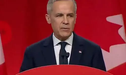 PM Carney says the Canadian government is dissatisfied by US tariffs but is still committed to CUSMA