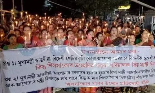 Candlelight protest by Silsako evictees in Sasal, demand land-for-land compensation
