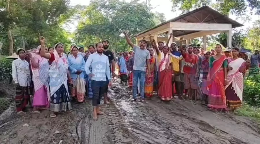 Knee-deep in mud, hundreds protest deplorable road condition in Jorhats Hatipara