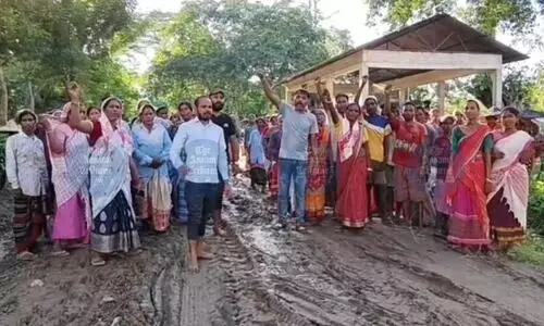 Knee-deep in mud, hundreds protest deplorable road condition in Jorhats Hatipara