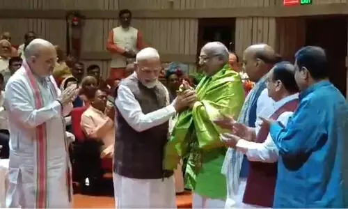At the NDA parliamentary party meeting, PM Modi felicitates CP Radhakrishnan and calls for a unanimous election