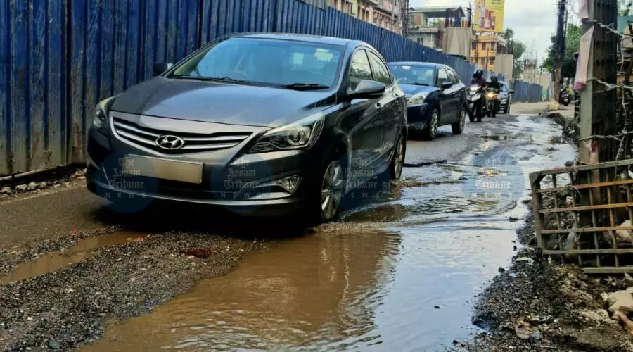 Potholes, mud & flyover work: Commuting in Guwahati is survival game Potholes, mud & flyover work: Commuting in Guwahati is survival game
