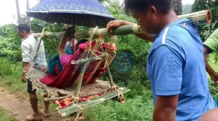 Woman in labour carried 7 km on bamboo stretcher in Assam Rangmali