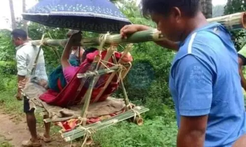 Woman in labour carried 7 km on bamboo stretcher in Assam Rangmali