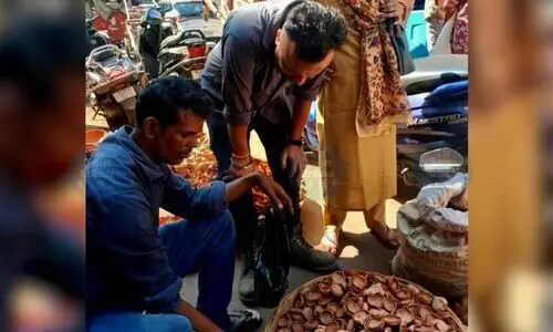 Earthen lamps replace flashy lights as Guwahati marks quieter Diwali