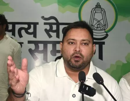Tejashwi vows permanent jobs, Rs 30,000 pay for Jivika Didis if RJD wins polls Tejashwi vows permanent jobs, Rs 30,000 pay for Jivika Didis if RJD wins polls