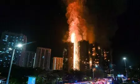 Hong Kong building fire toll rises to 55, says fire department Hong Kong building fire toll rises to 55, says fire department