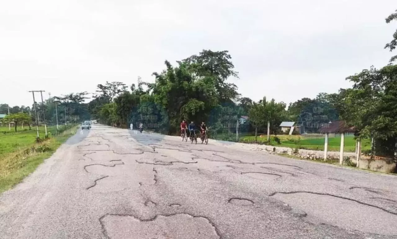 Crater-filled NH-15 puts commuters at risk, residents demand urgent repairs Crater-filled NH-15 puts commuters at risk, residents demand urgent repairs