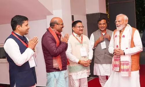 On first Assam BJP HQ visit, PM Modi blends in with party workers, talks polls