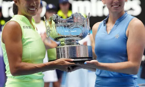 Mertens and Zhang claim Australian Open women’s doubles trophy