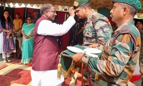 Guv Lakshman Prasad Acharya celebrates Holi with 38 Assam Rifles troops in Cachar
