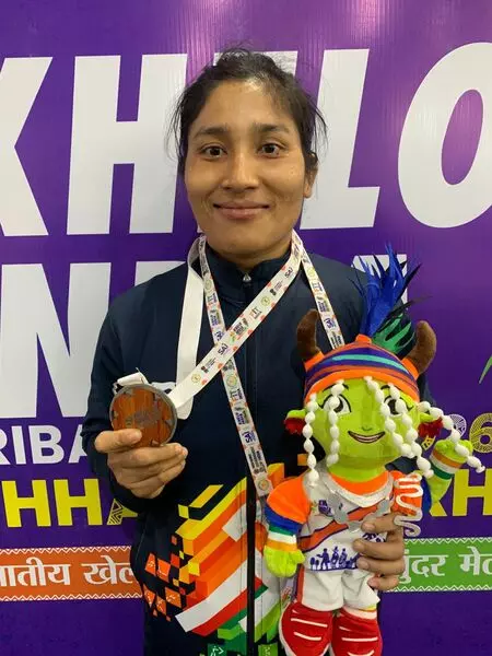 ​KITG 2026: Assam’s Debi Daimari overcomes financial odds to clinch wrestling silver