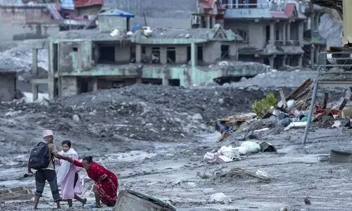 Nepal’s temporary burial of flood victims sparks row over Hindu funeral rites
